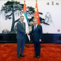 巴中王毅会见阿联酋总统中国事务特使哈勒敦
